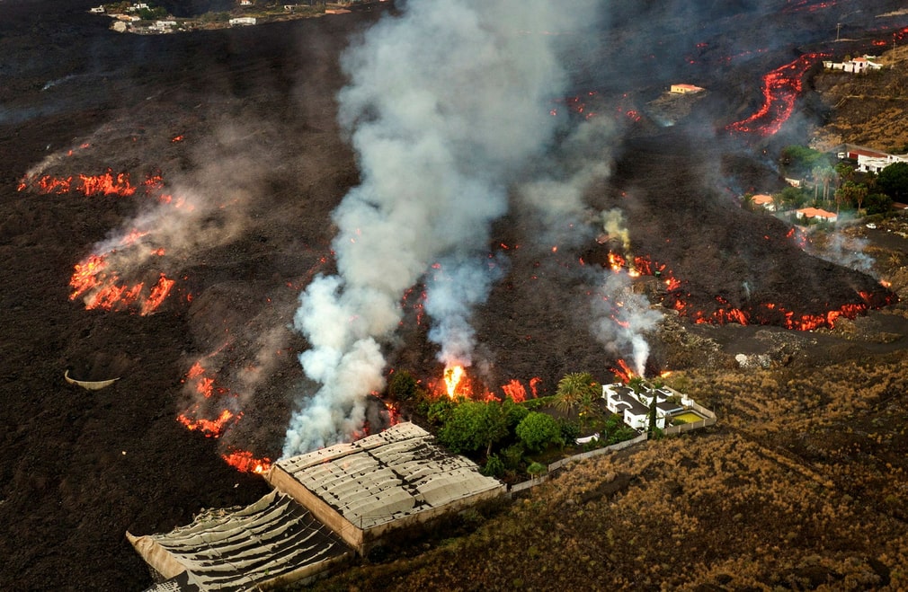 Lava destroys homes and banana plantations during a volcanic eruption.  October 29.