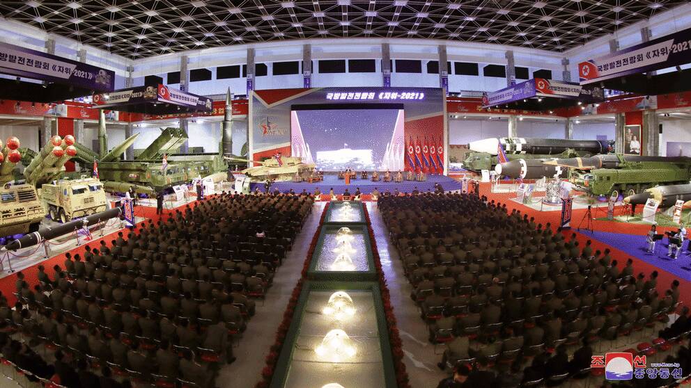 Dictator Kim Jong Un delivers a speech at a defense fair in the North Korean capital, Pyongyang.  Photo distributed by the state-controlled news agency. 