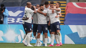 Manchester City celebrate the goal.