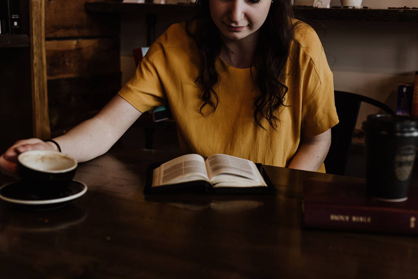 Young woman reading the Bible.