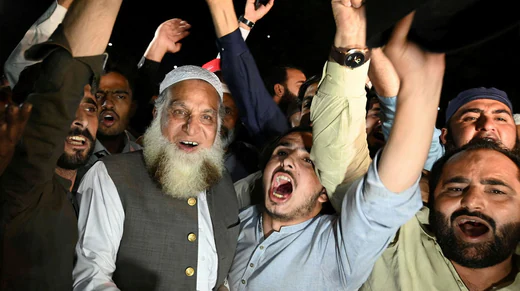 Joy outside Parliament in Islamabad.