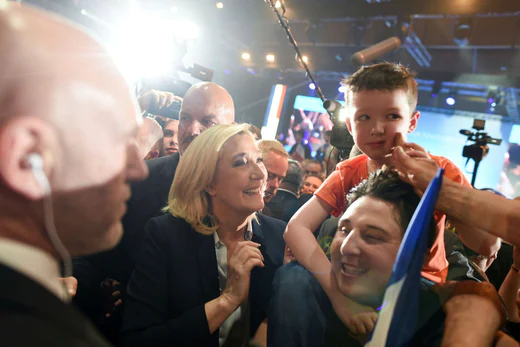 Marine Le Pen salutes her supporters in the days leading up to the crucial round of the French presidential election.
