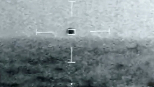 A still image from a movie taken aboard the USS Omaha shows an unidentified object on its way to the water on July 15, 2019.