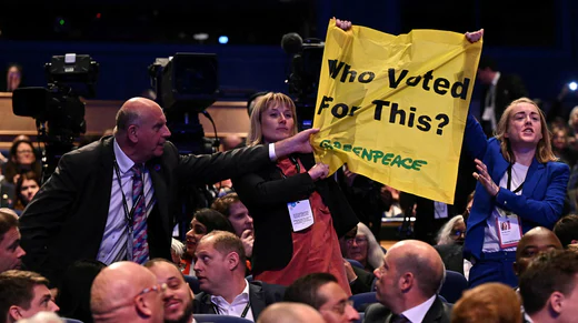 Greenpeace activists entered the Conservative Conference disguised as delegates.